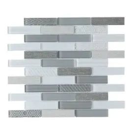 Modern mosaic backsplash composed of rectangular tiles in varying shades of gray and white with textured and smooth finishes for home improvement.