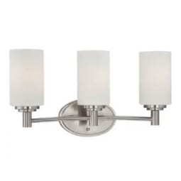 Three-light bathroom vanity fixture with cylindrical frosted glass shades and brushed nickel curved arm mounted on an oval backplate.