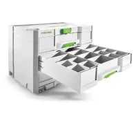 Modular white and green storage system with multiple compartments and drawers, designed for organized tool and accessory storage in home improvement settings.