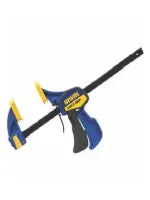 Trigger-style bar clamp with blue and yellow plastic jaws and black metal bar used for woodworking and home improvement tasks.