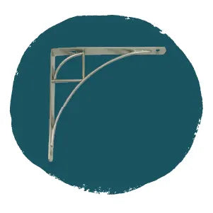Polished metal corner bracket with a decorative curved support design, displayed against a solid dark teal background, suitable for home improvement or tools.
