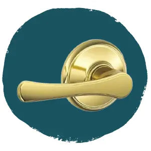 Polished brass door handle with a curved lever design mounted on a round rose against a teal circular background.