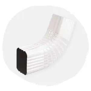 Angled white metal downspout elbow with corrugated grooves designed for gutter systems, shown against a plain neutral background.