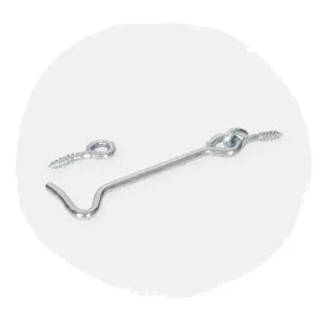 Silver metal hook and eye latch with screw-in ends displayed on a soft light gray circular background, suitable for home improvement or hardware use.