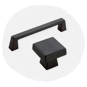 Matte black cabinet pull handle and matching square knob with clean, modern lines displayed on a light circular background.