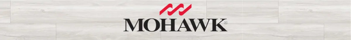 Minimalist header image featuring the Mohawk logo centered above light gray wood-patterned flooring, evoking a home improvement theme.