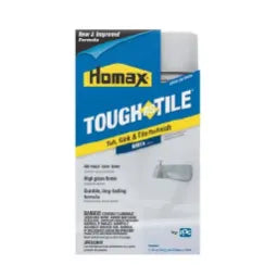 Bag of Homax Tough Tile tile, caulk, and grime remover with white and blue packaging used for home improvement cleaning tasks