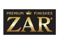 Rectangular logo with a black background featuring the gold text 