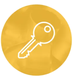 White line icon of a classic key shape centered on a textured gold circular background with subtle marbled patterns.