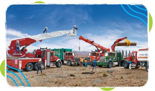 Detailed scene of toy fire trucks, cranes, and utility vehicles arranged on a gravel surface with miniature figures working under a blue sky.
