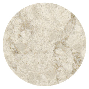 Close-up view of a creamy beige stone surface featuring subtle veining and a fine, natural texture with soft variations in color.