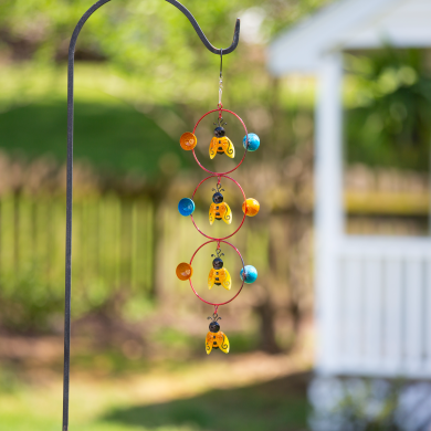Three-tiered garden stake with colorful bumblebee orbits for outdoor decor and lawn and garden settings under $50.