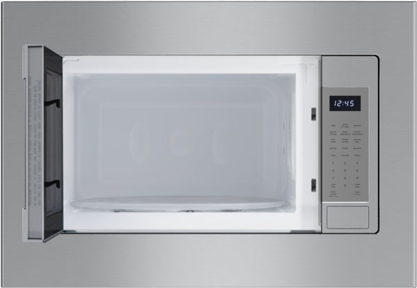 Built-in stainless steel microwave with left side door open, digital control panel, and glass turntable inside.
