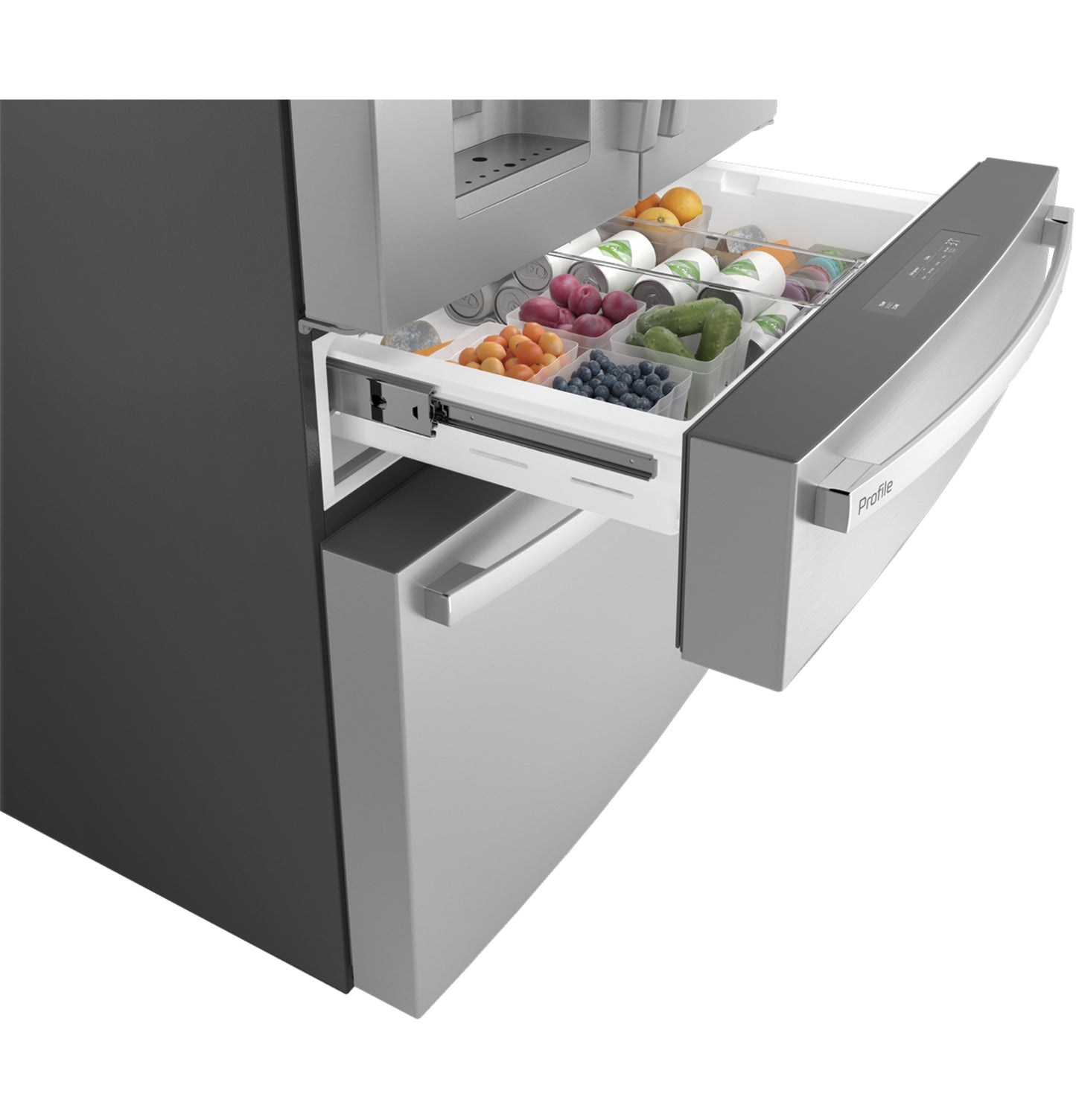 Lower drawer open in stainless steel French-door refrigerator showing organized compartments with fresh produce and bottles inside
