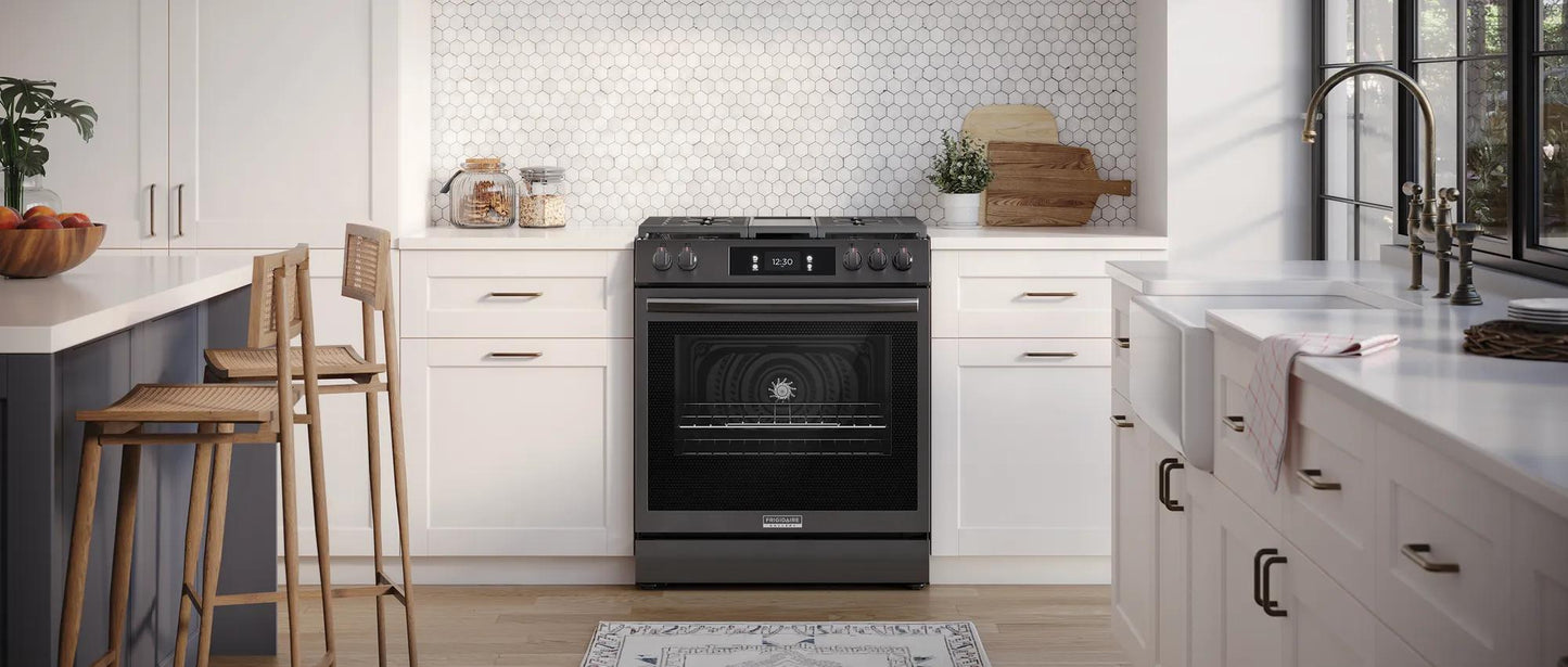 30-inch front control gas range with digital display and convection oven in modern kitchen setting