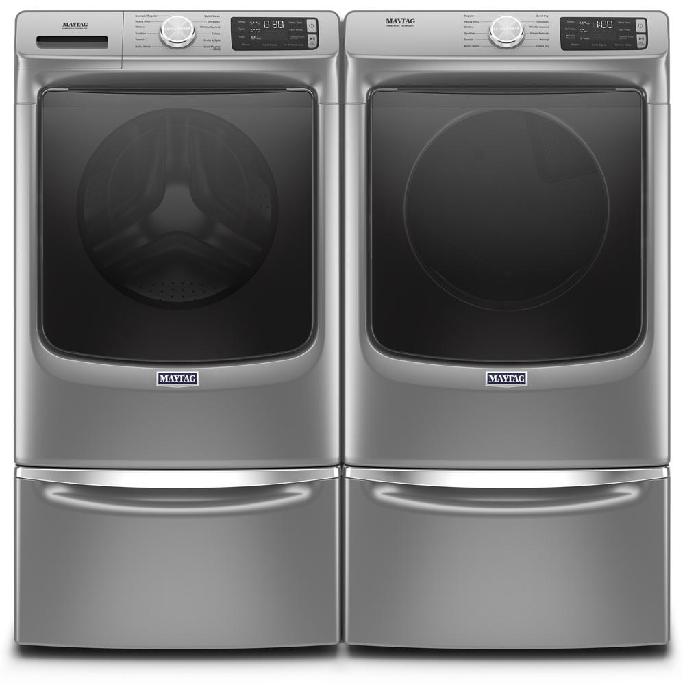 Pair of silver front load Maytag washer and gas dryer with digital controls in laundry appliances collection