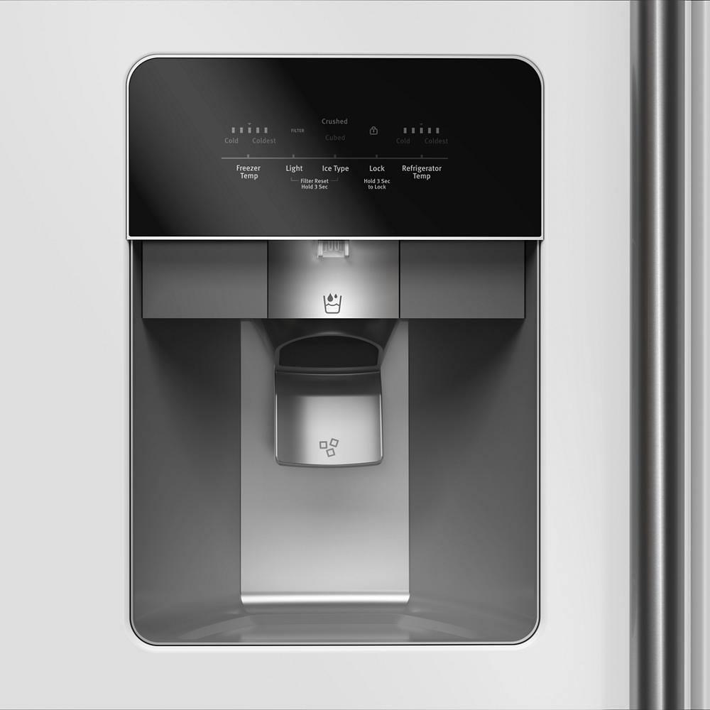 Close-up of stainless steel side-by-side refrigerator water and ice dispenser with digital control panel in appliances collection