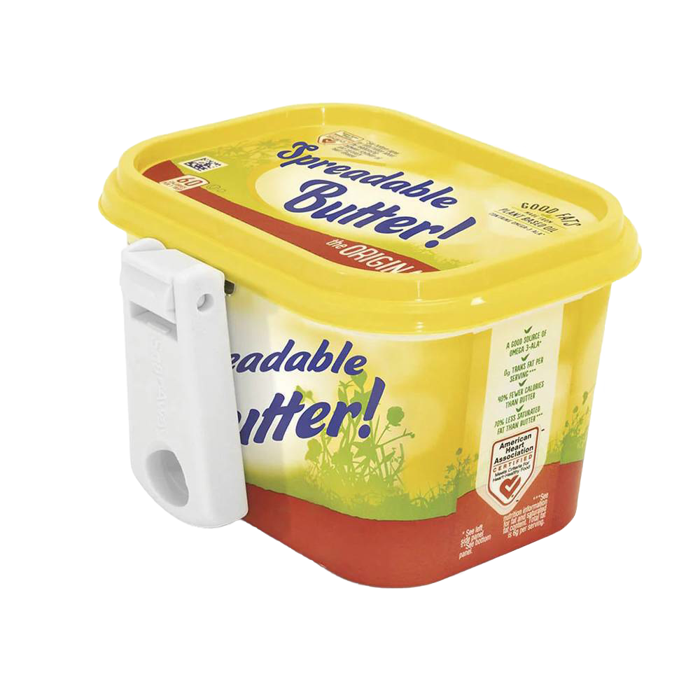 White plastic collapsible handle butter knife clipped to yellow spreadable butter tub for kitchen gadgets under $50