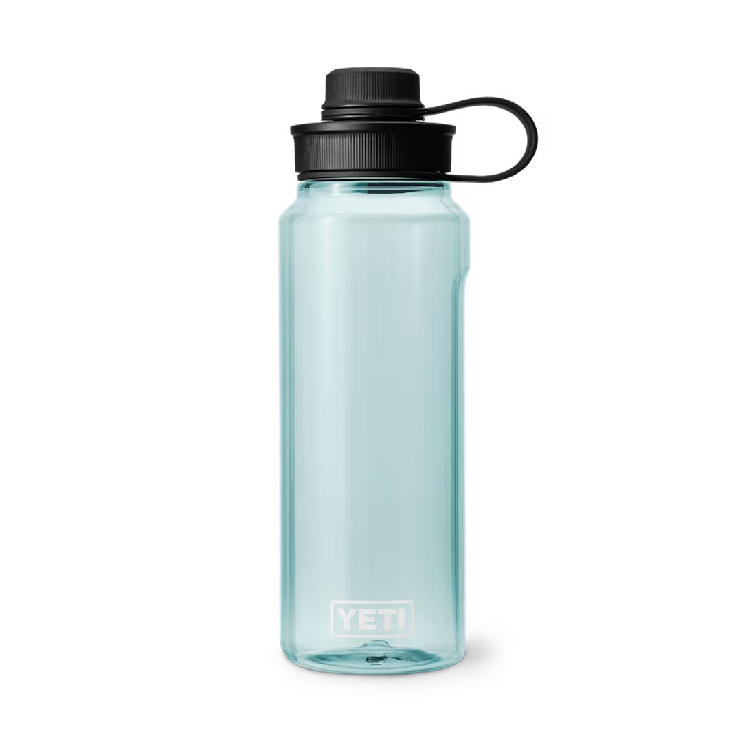 Light teal 1L water bottle with black tether cap and YETI logo, built for rugged use in drinkware and kitchenware collections under $50.