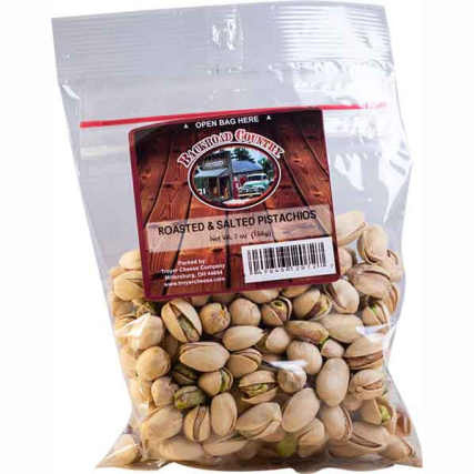 Clear resealable bag filled with roasted and salted shelled pistachios featuring a rustic branded label