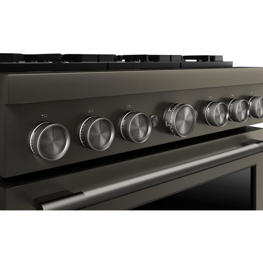 Close-up of dark stainless steel control knobs and handle on 36-inch commercial-style dual fuel range from KitchenAid collection