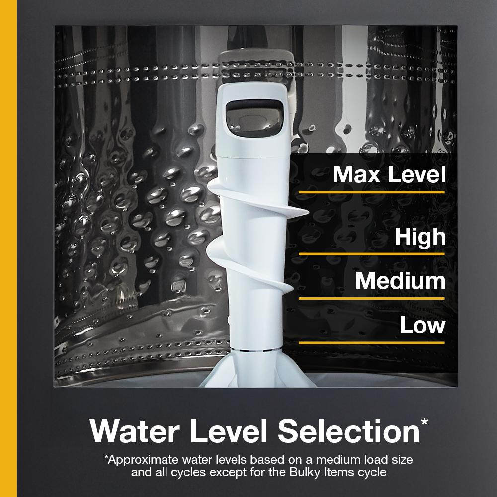 Interior view of top load washer drum with 2-in-1 removable agitator and water level selection guide
