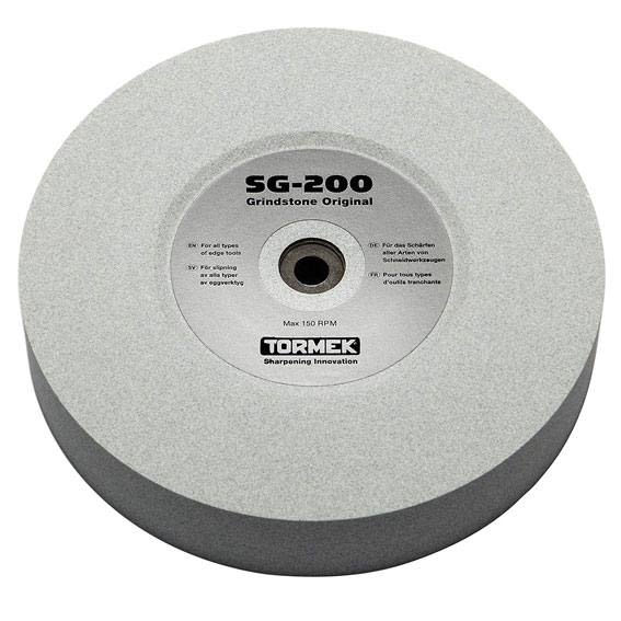 Circular gray grindstone wheel with central label showing model and usage details for tool sharpening.