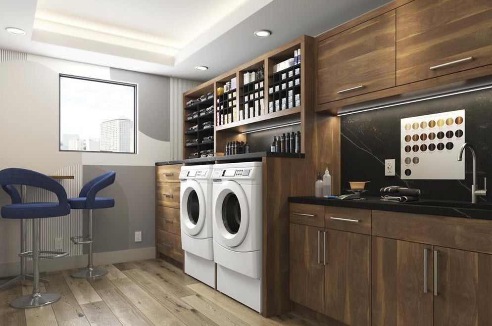 White front-load washer and dryer set in wood-paneled laundry room from washers and appliances collection