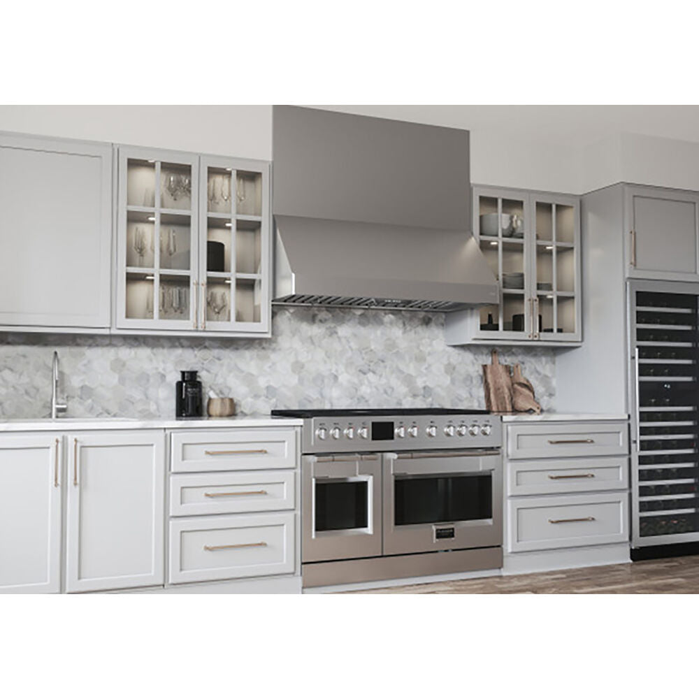 Stainless steel canopy hood with LED lighting above double oven range in kitchen and range hoods collection