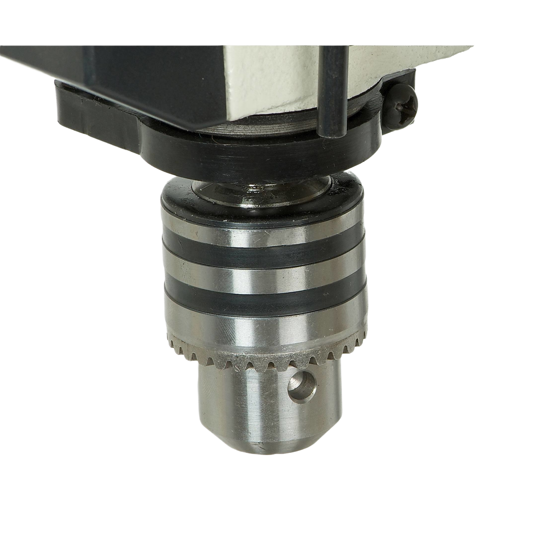 Close-up view of metal drill chuck and spindle assembly on benchtop drill press for tools and home improvement use