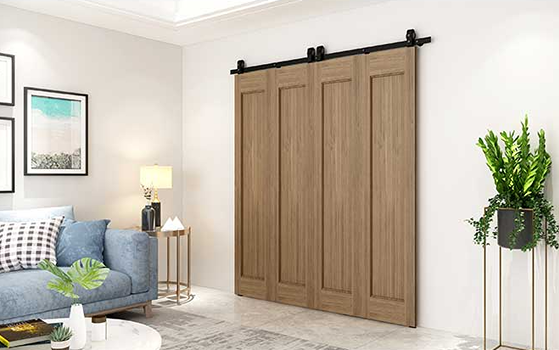 Black flat track hardware installed for smooth operation of wooden bi-fold doors in a modern home interior setting