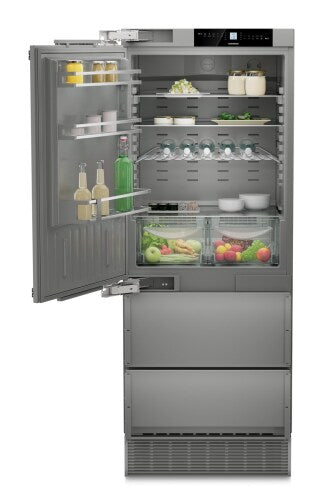 Built-in stainless steel refrigerator/freezer with left hinge, ice maker, adjustable shelves, and clear drawers in appliances collection