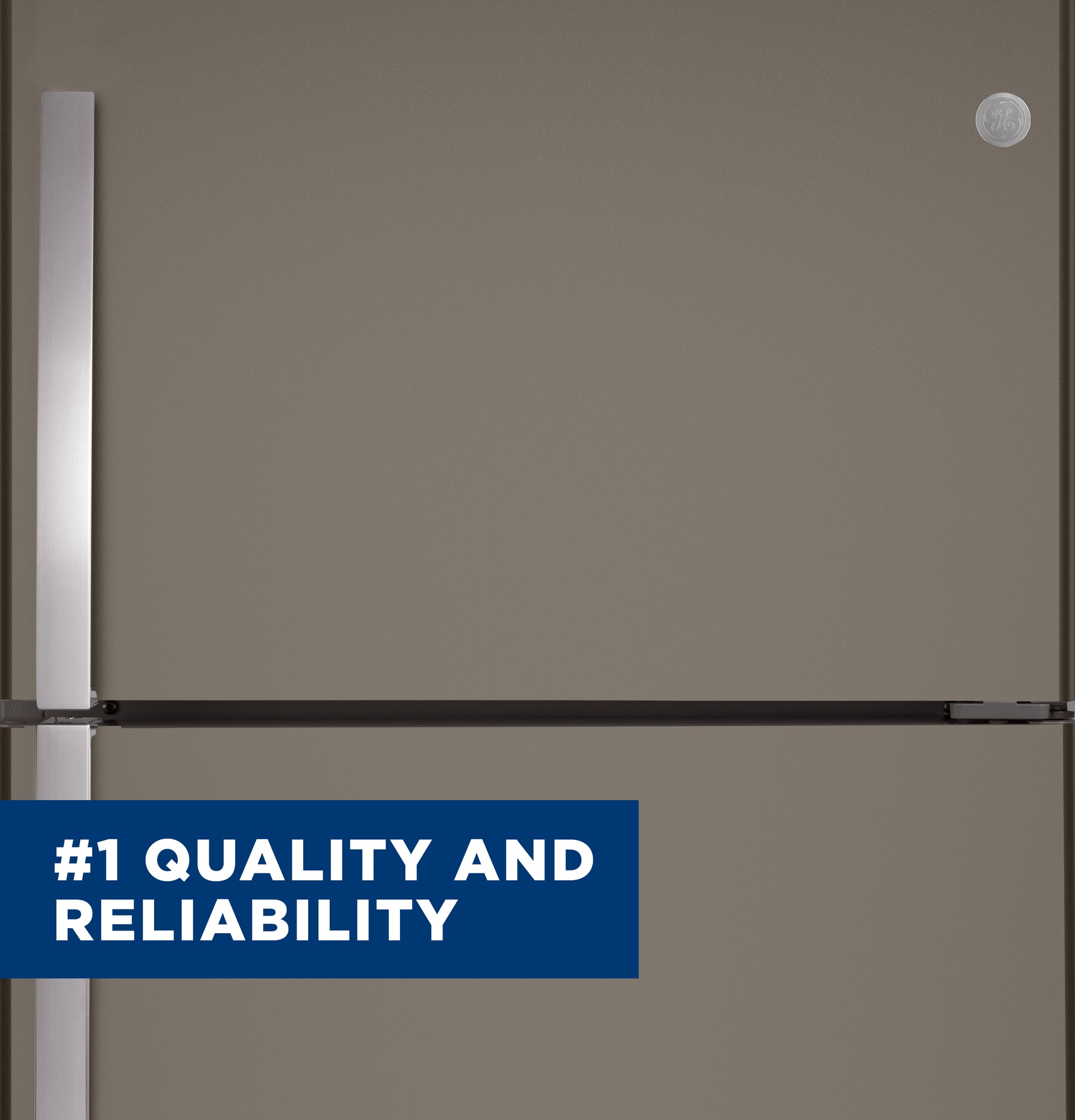 Garage ready top-freezer refrigerator in matte gray finish with sleek silver handles and quality assurance emblem