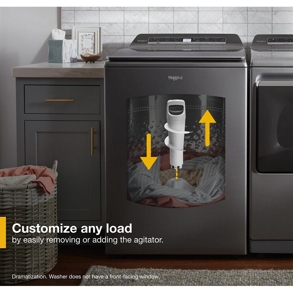 Gray top load washer in laundry room with digital control panel and removable agitator demonstration from Top Load Washers collection