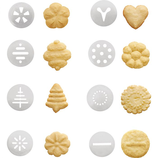 White plastic cookie press discs with various shaped baked cookies for bakeware and kitchen gadget collections under $50