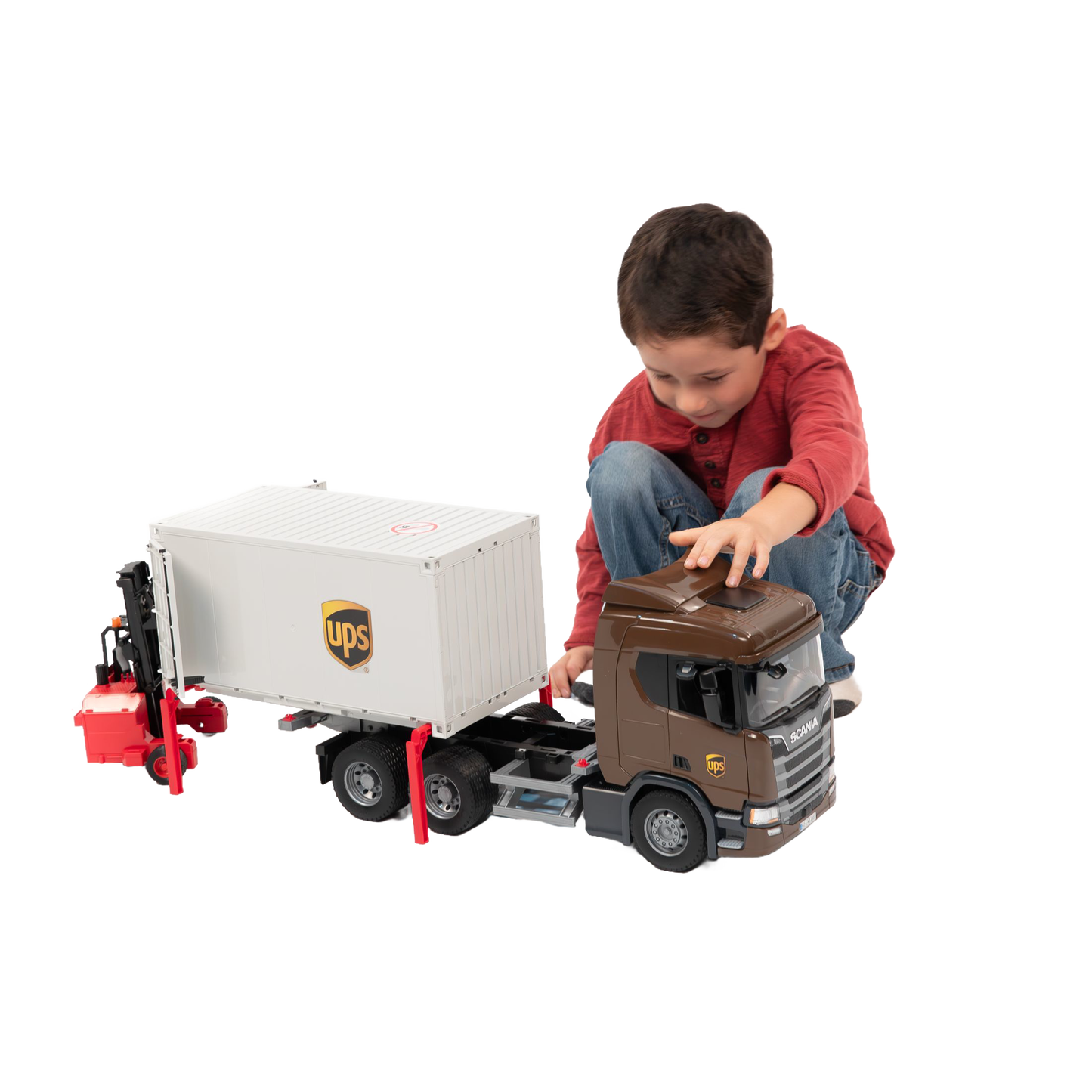 Child playing with detailed brown and white UPS logistics toy truck and red forklift from Bruder Toys collection