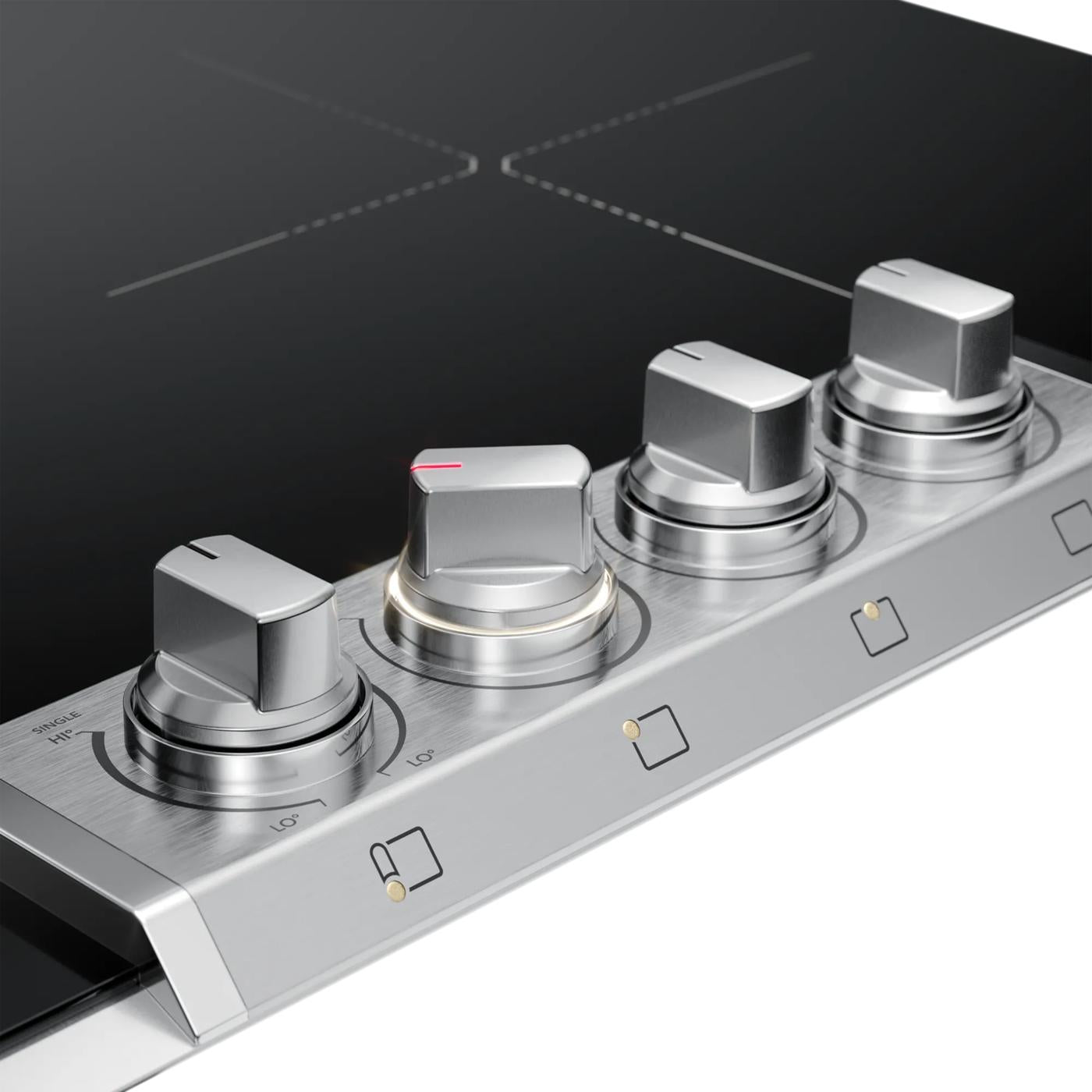 Close-up of stainless steel control knobs on a black induction cooktop in appliances and kitchenware collection