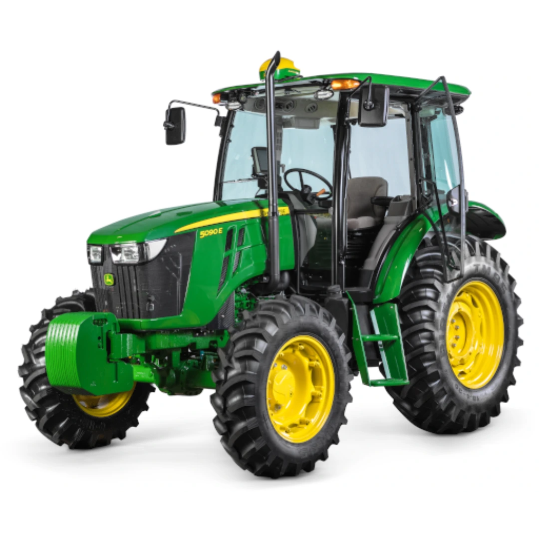 Green and yellow utility tractor with enclosed cab and large rugged tires for agricultural and home improvement use