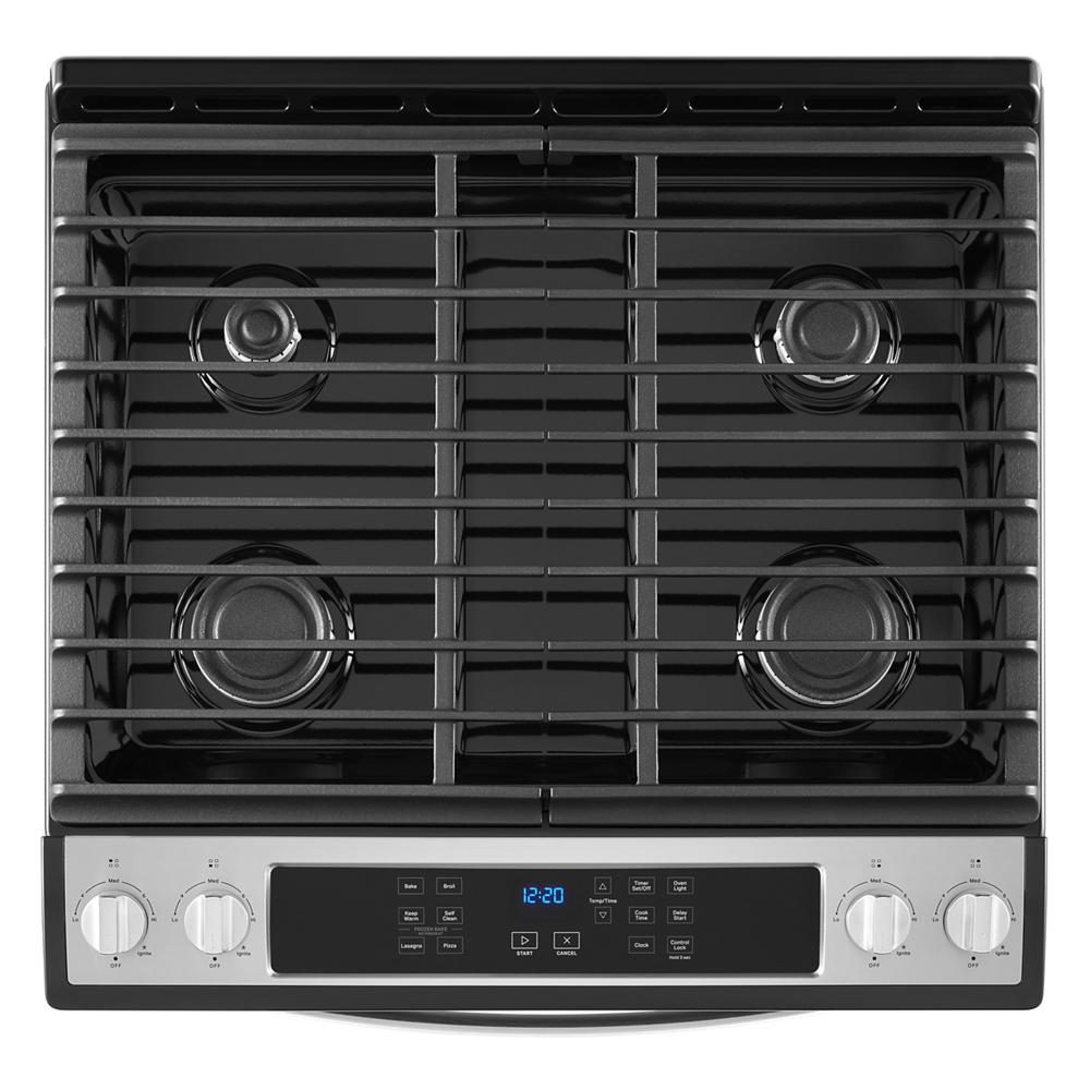 Top view of a stainless steel gas cooktop with four burners and digital control panel from Ranges & Kitchenware collection