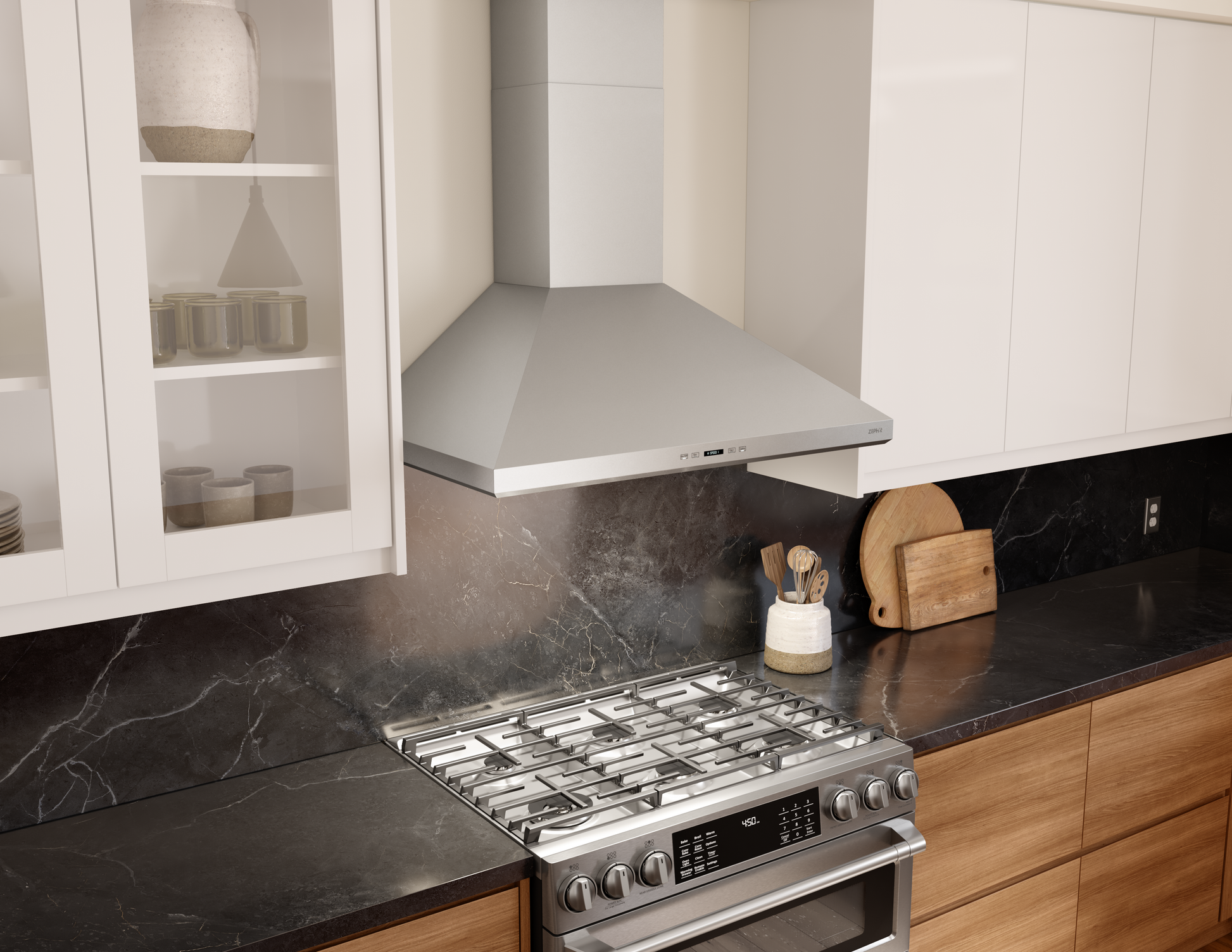 Stainless steel wall range hood with LED lights above gas stove in modern kitchen and appliances collection