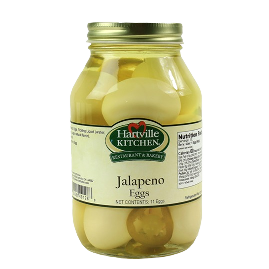 Glass jar of Hartville Kitchen jalapeno-infused eggs in pickling liquid from preserved goods and food & beverage collections