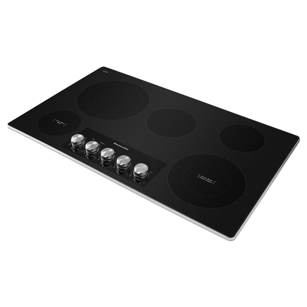 Black electric cooktop with five radiant cooking zones and stainless steel knob controls from KitchenAid appliances collection
