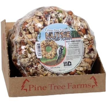 Natural seed wreath with mixed nuts wrapped in clear plastic, displayed in a branded cardboard tray for bird feeding.
