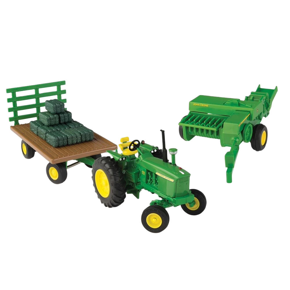 Green die-cast 1:32 scale John Deere toy tractor with hay wagon loaded with bales and separate hay baler for kids.