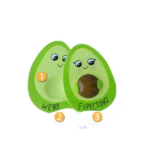Two cartoon avocados with smiling faces and "We're Expecting" text for Christmas Ornaments collection