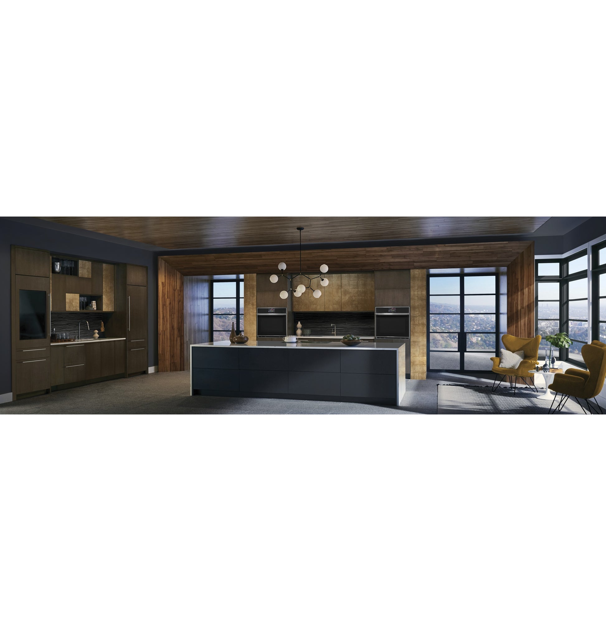Contemporary kitchen with dark wood cabinetry, large island, dual wall ovens, and corner seating in appliances collection