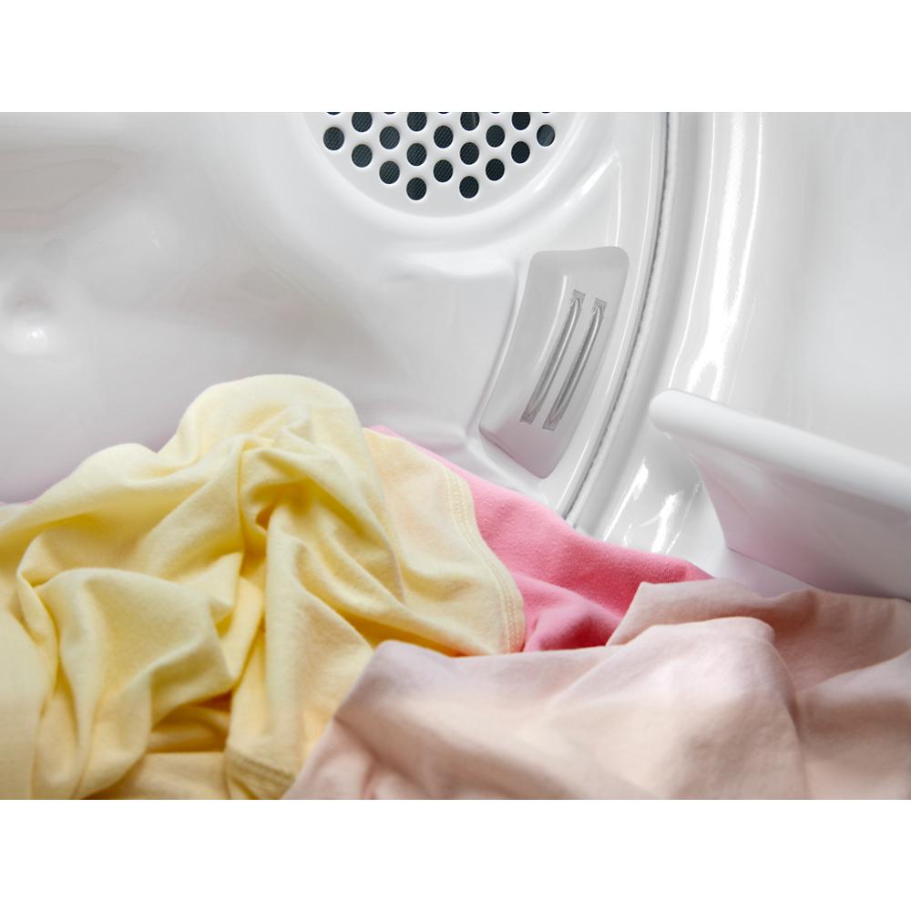 Close-up of pastel-colored laundry tumbling inside a white gas dryer drum from Dryers collection