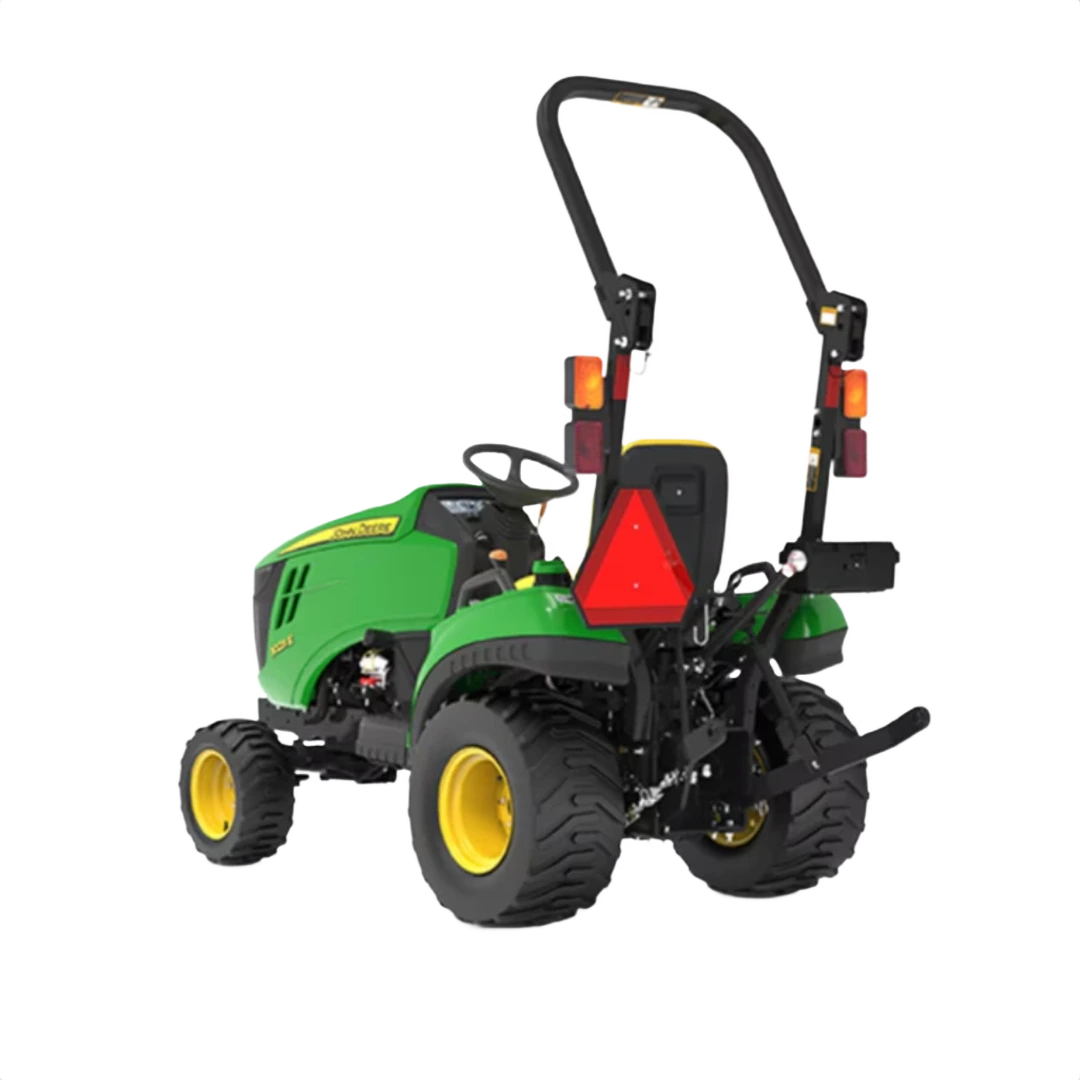 Rear view of green and yellow sub-compact utility tractor with roll bar and wide tires for home improvement tasks