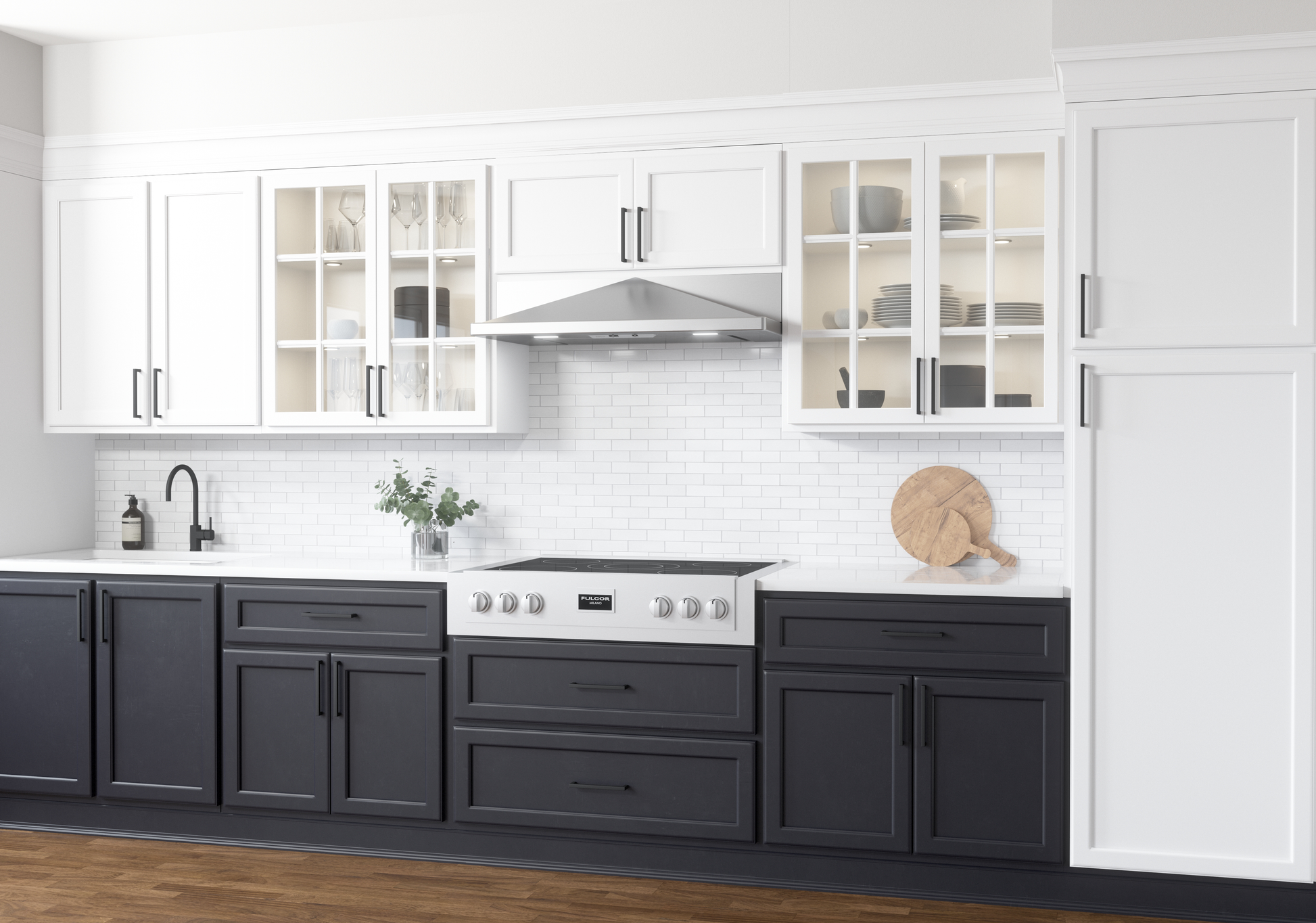 Stainless steel under cabinet range hood installed above modern electric cooktop in kitchen and home improvement setting