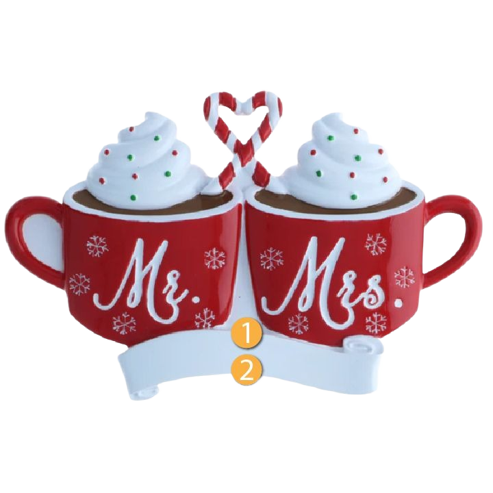 Red Mr. and Mrs. mugs filled with hot cocoa and whipped cream, heart-shaped candy canes for Christmas décor under $50 collection